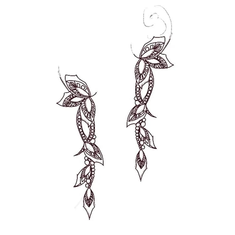 Line drawing of long floral earrings.