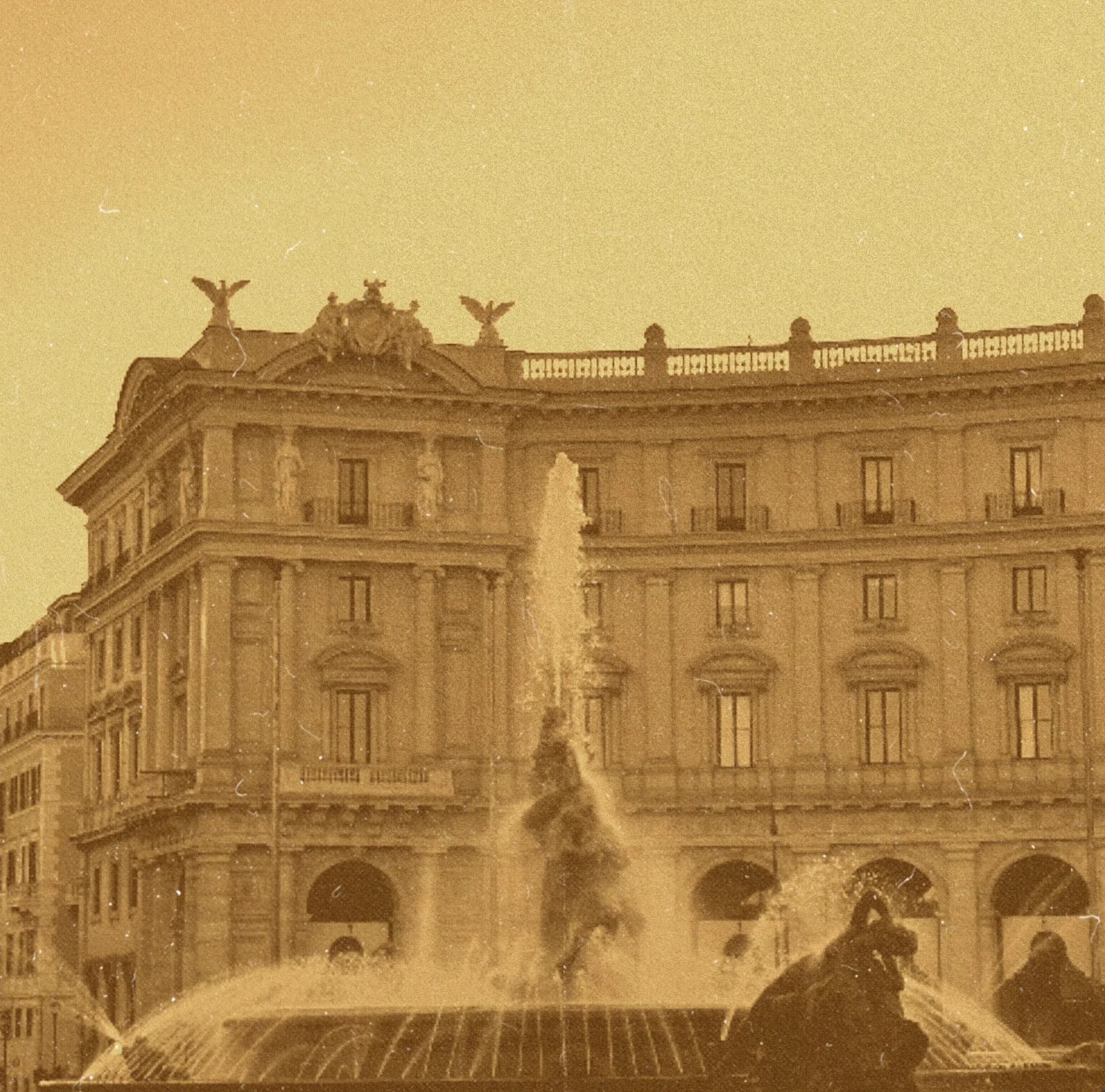 Sepia facade of a large building.