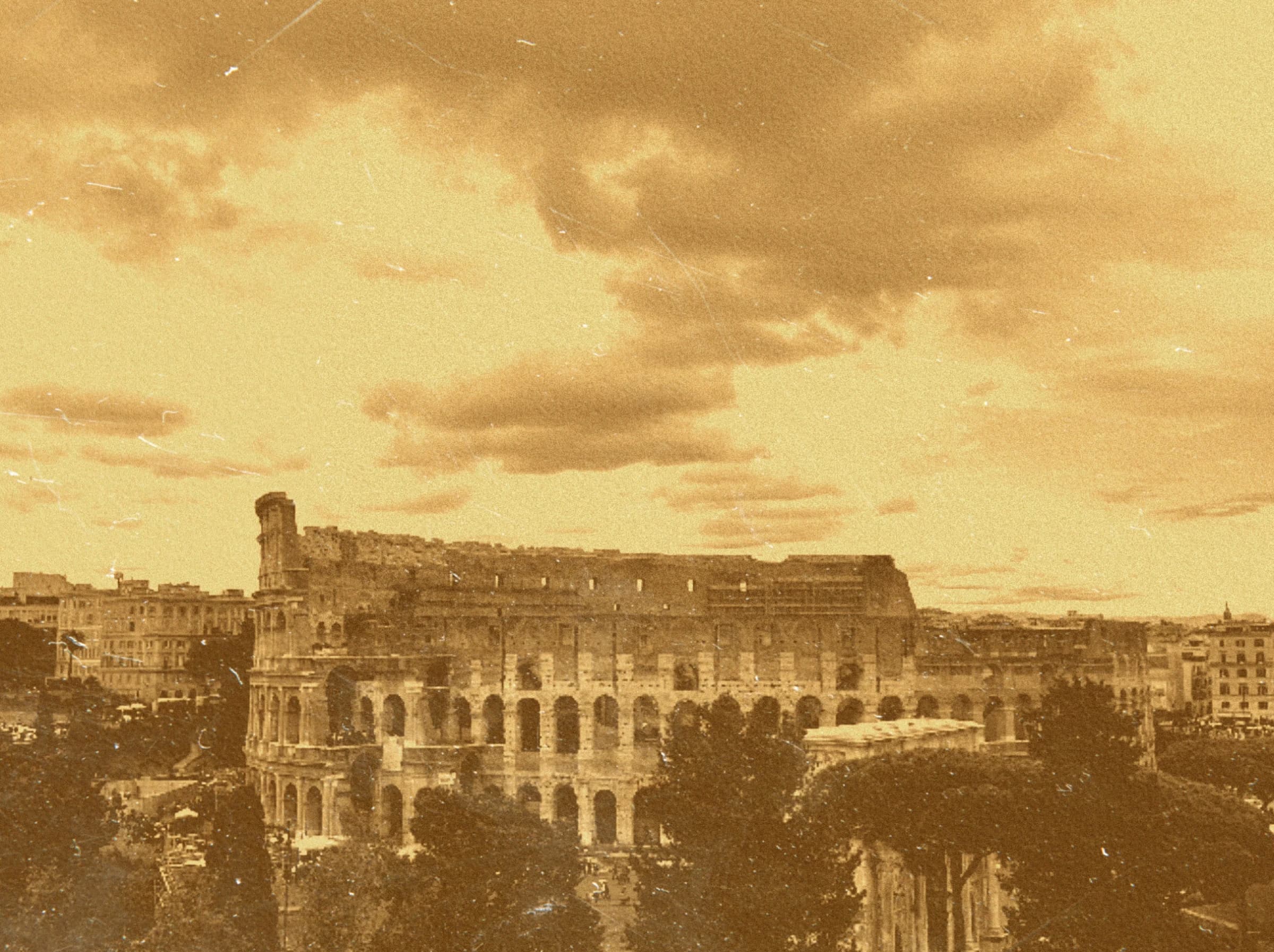 Sepia panorama of ruins under clouds.